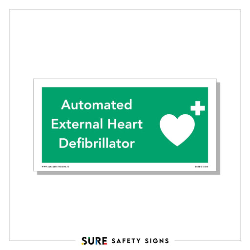 Green safety sign with white text reading Automated External Heart Defibrillator alongside a white heart symbol with a cross in the top corner. The bottom features a URL for suresafetysigns.ie, indicating its origin in Ireland.