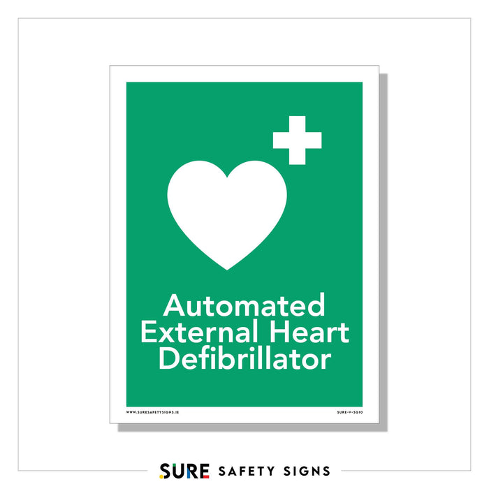 Green safety sign with a white heart and a plus symbol above it, labeled Automated External Heart Defibrillator. The border is white, and SURE SAFETY SIGNS is printed at the bottom. This essential sign helps save lives in Ireland and beyond.