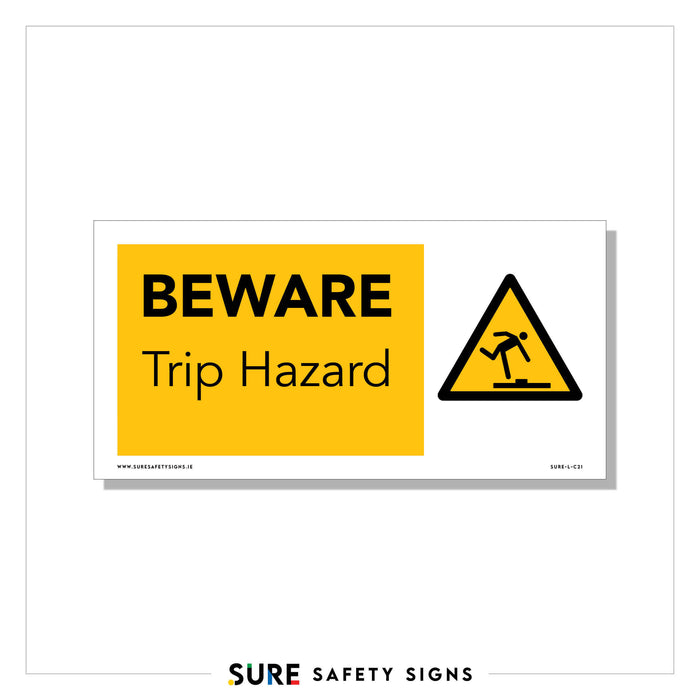 A yellow and white warning sign displaying BEWARE Trip Hazard with a triangular symbol showing a person tripping, adhering to safety standards.