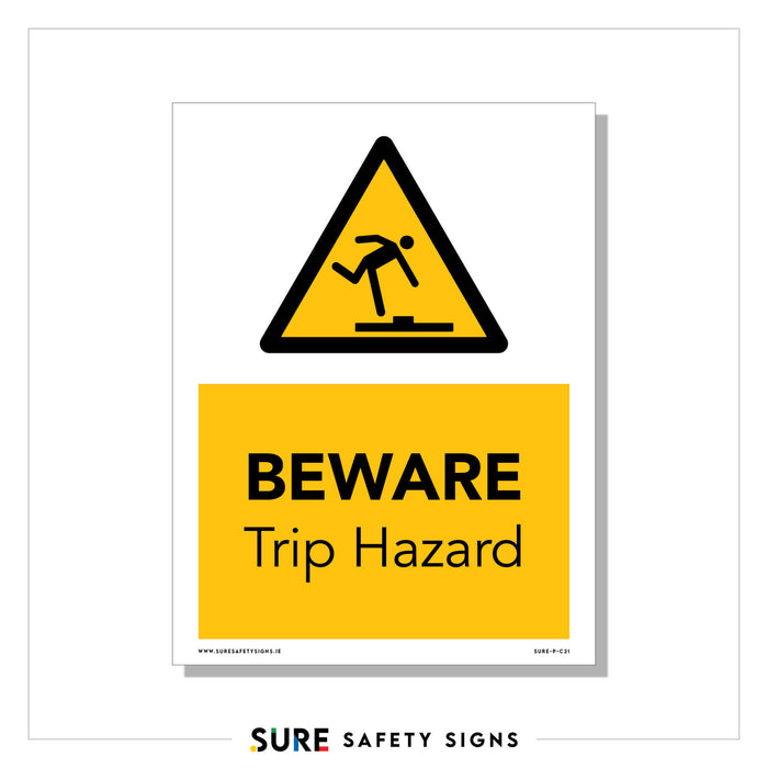 A yellow and black warning sign with a triangular caution symbol depicts a person tripping over an obstacle. The text reads, BEWARE Trip Hazard. At the bottom, the brand name SURE SAFETY SIGNS ensures adherence to safety standards.