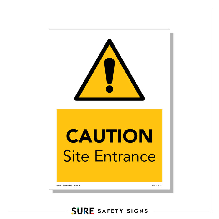 Safety signage featuring a yellow triangle with an exclamation mark above the words CAUTION Site Entrance alerts visitors as they approach the construction site entrance. The sign, set against a white background and framed by a thin black border, ensures critical warnings are clearly visible.