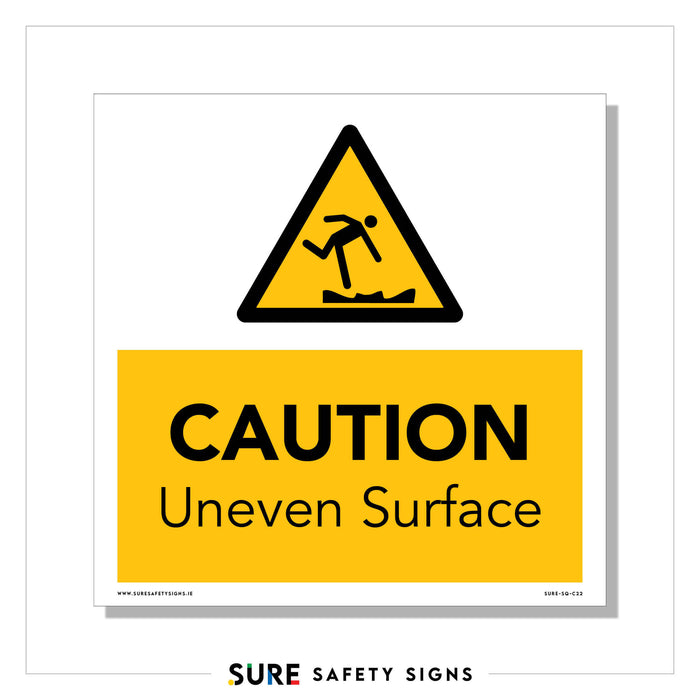 Yellow safety sign with a triangle at the top depicting a figure tripping over an uneven surface. Below, it reads CAUTION Uneven Surface in bold black text on a yellow background, reminding all in Ireland to watch their step.