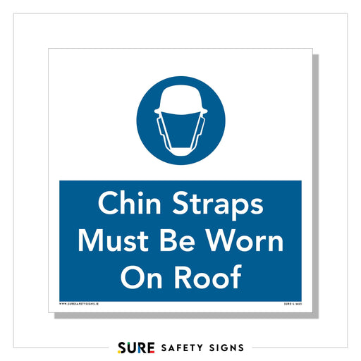 A safety sign in Ireland features a blue background with a white silhouette of a hard hat equipped with a chin strap. Below the image, bold white text on blue insists, Chin Straps Must Be Worn On Roof.