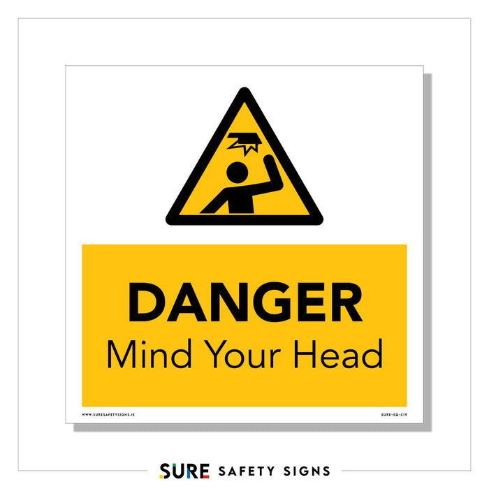 A safety sign featuring a yellow triangle with a black figure encountering an obstacle, serves as a Mind Your Head Danger Sign. Below, in a yellow rectangle, the text warns to prevent head injuries by stating DANGER Mind Your Head.