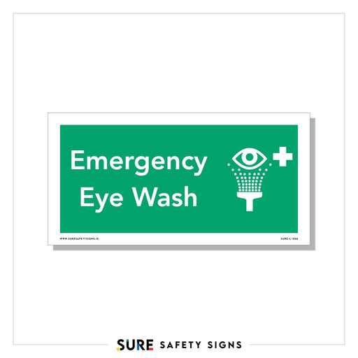 Green rectangular safety sign displaying Emergency Eye Wash in white text, accompanied by an icon of an eye above a water fountain, indicating the location of an eye wash station. Commonly seen across various facilities in Ireland to ensure swift response during emergencies.