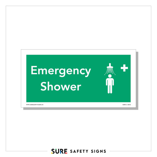 A safety sign clearly indicating Emergency Shower, featuring a symbol of a person under a shower and a white cross on a green background, ensures visible signage in critical areas.