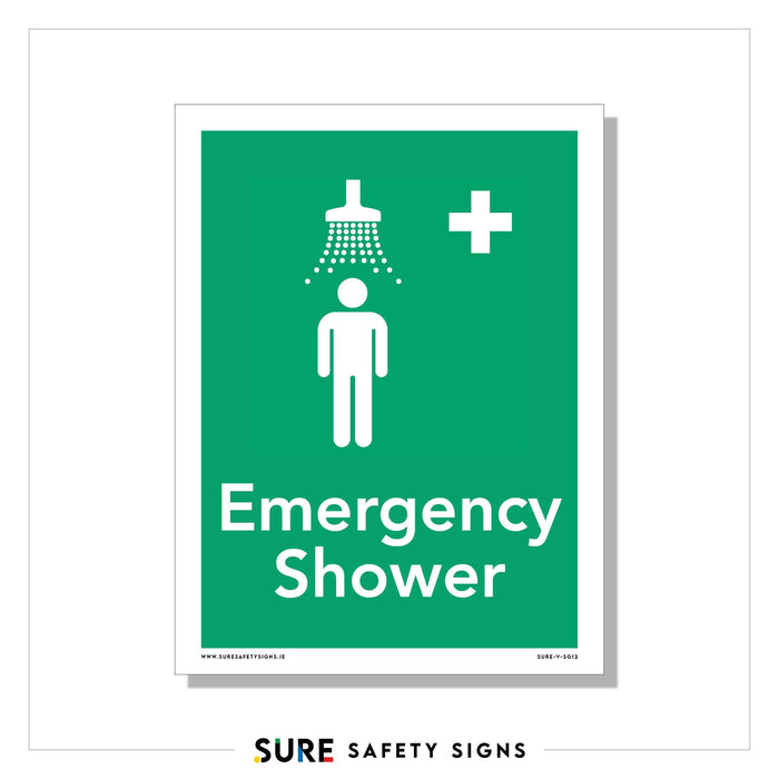 Green safety sign featuring a white figure under a showerhead, with a plus symbol on the upper right. The text Emergency Shower below ensures clear and visible signage.