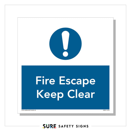 Part of the Sure Safety Signs collection, this safety sign features a blue exclamation mark inside a circle above the text Fire Escape Keep Clear in white letters on a blue background, ensuring compliance with safety standards in Ireland.