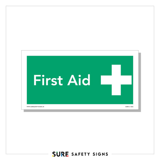 A rectangular First Aid sign with a green background displays the text First Aid in white, next to a white cross symbol. Complying with safety regulations, the bottom of the sign includes www.suresafetysigns.ie and product code SASS-FAS3.