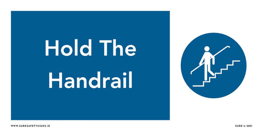 A safety sign commonly seen in Ireland features a blue background with white text reading, Hold The Handrail. Beside the text, an icon depicts a person walking on stairs, ensuring everyone adheres to safety measures.