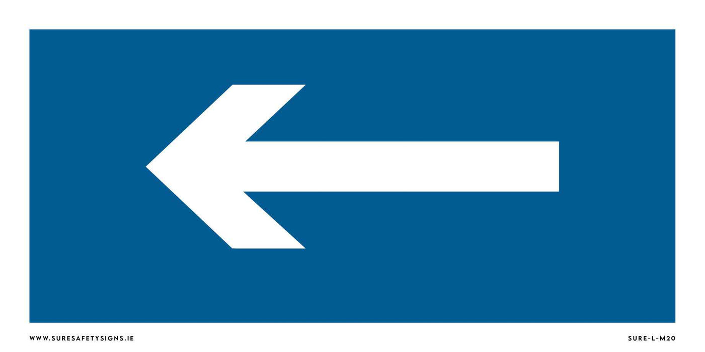 A blue safety sign featuring a bold white left-pointing arrow in the center ensures clear navigation, inspired by Irelands commitment to road safety.