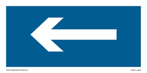 A blue safety sign featuring a bold white left-pointing arrow in the center ensures clear navigation, inspired by Irelands commitment to road safety.
