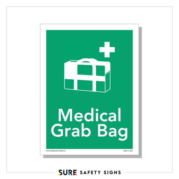 Green safety sign with a white first aid kit icon and cross symbol, reminiscent of those in Ireland. Text below reads Medical Grab Bag.