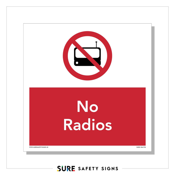 A square safety sign featuring a red circle and diagonal line over a radio icon signifies prohibition. Below, in a red rectangle, it reads No Radios. Commonly seen across Ireland, this design ensures clear communication of restricted items.
