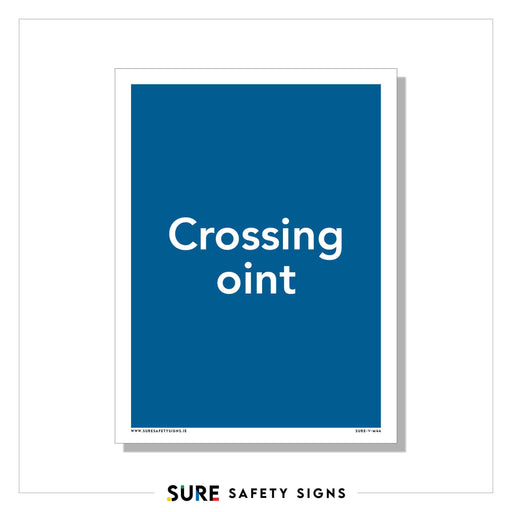 A safety sign with a blue background displays the text Crossing Point, reflecting Irelands commitment to road safety. At the bottom, it reads SURE SAFETY SIGNS in different colors.