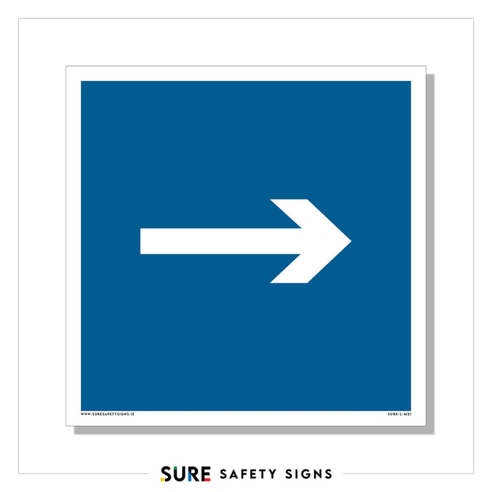 Blue square sign with a white arrow pointing to the right, serving as a navigation aid and adhering to safety standards to indicate direction or movement.