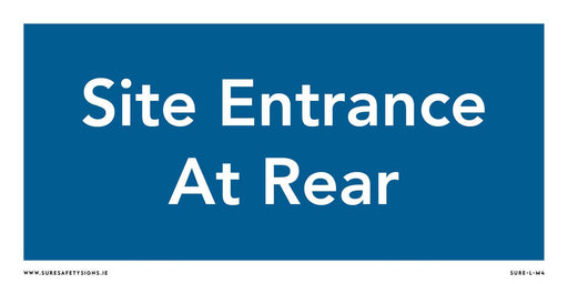 Blue safety sign with white text that reads, Site Entrance At Rear, ensuring clear guidance in Ireland.