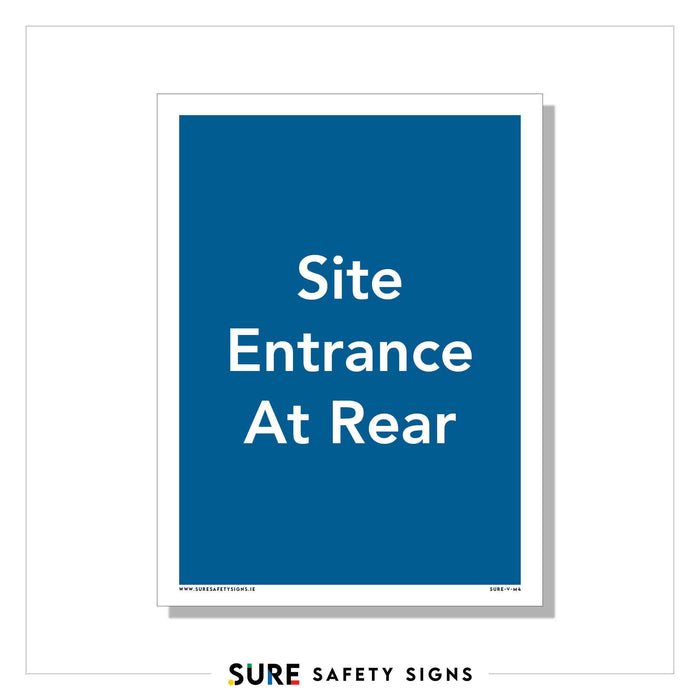 A blue safety sign with white text reads Site Entrance At Rear, featuring the Sure Safety Signs branding at the bottom. Found commonly on sites in Ireland, it ensures clear guidance for all personnel.