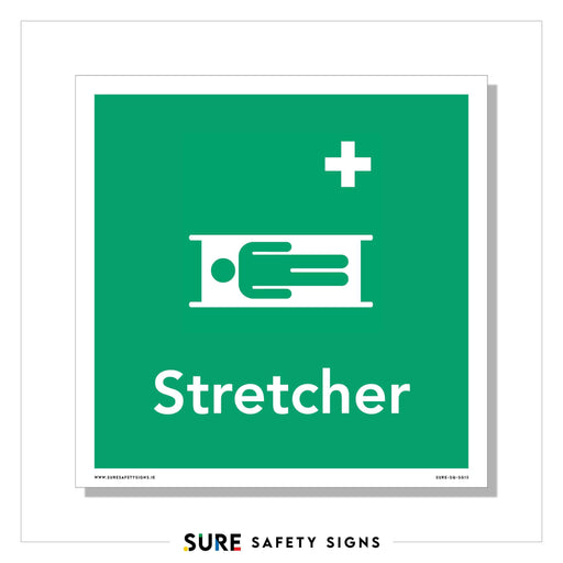 Green safety sign featuring a white icon of a person on a stretcher, accompanied by a white medical cross above. The word Stretcher is prominently displayed below the symbol, ensuring universal recognition and compliance with safety standards, including those in Ireland.