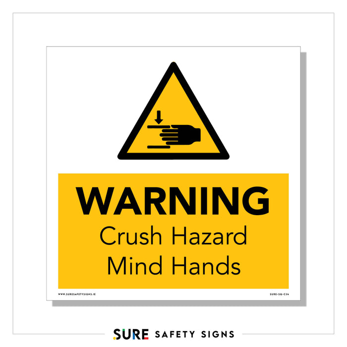 A warning sign featuring a yellow triangle displays an image of a hand being crushed by a block. Below, it warns: WARNING, Crush Hazard, Mind Hands. The sign emphasizes hand safety and is bordered by the words SURE SAFETY SIGNS.