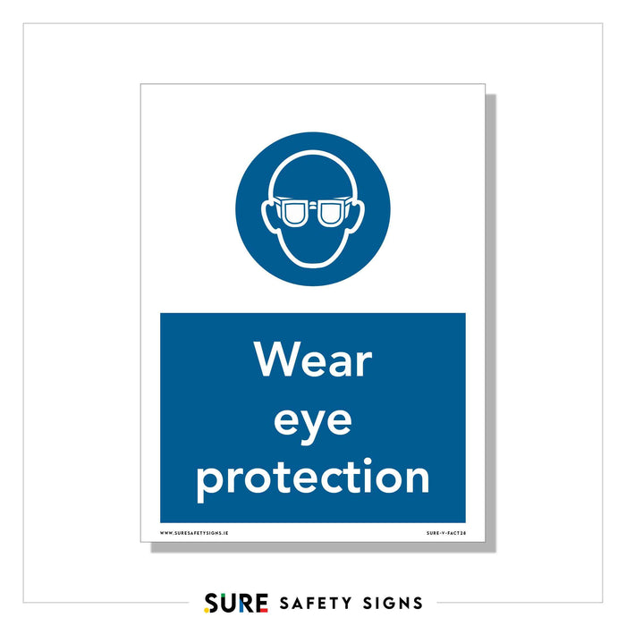 Blue and white safety sign featuring an icon of a person wearing goggles. The text below reads Wear eye protection. This essential safety sign is provided by Sure Safety Signs, trusted widely across Ireland.