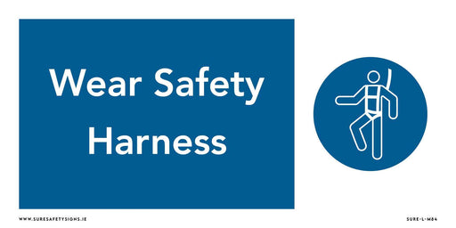 Blue and white safety sign featuring the text Wear Safety Harness on the left. On the right, an icon of a person wearing a safety harness serves as a reminder that in Ireland, workplace safety is paramount.