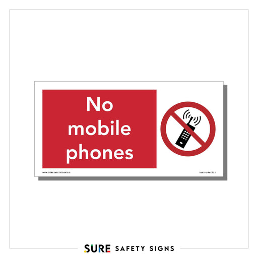 A rectangular safety sign with a red background displaying the text No mobile phones. Next to it, theres a graphic of a cell phone crossed out by a red circle and diagonal line, commonly seen in Ireland.